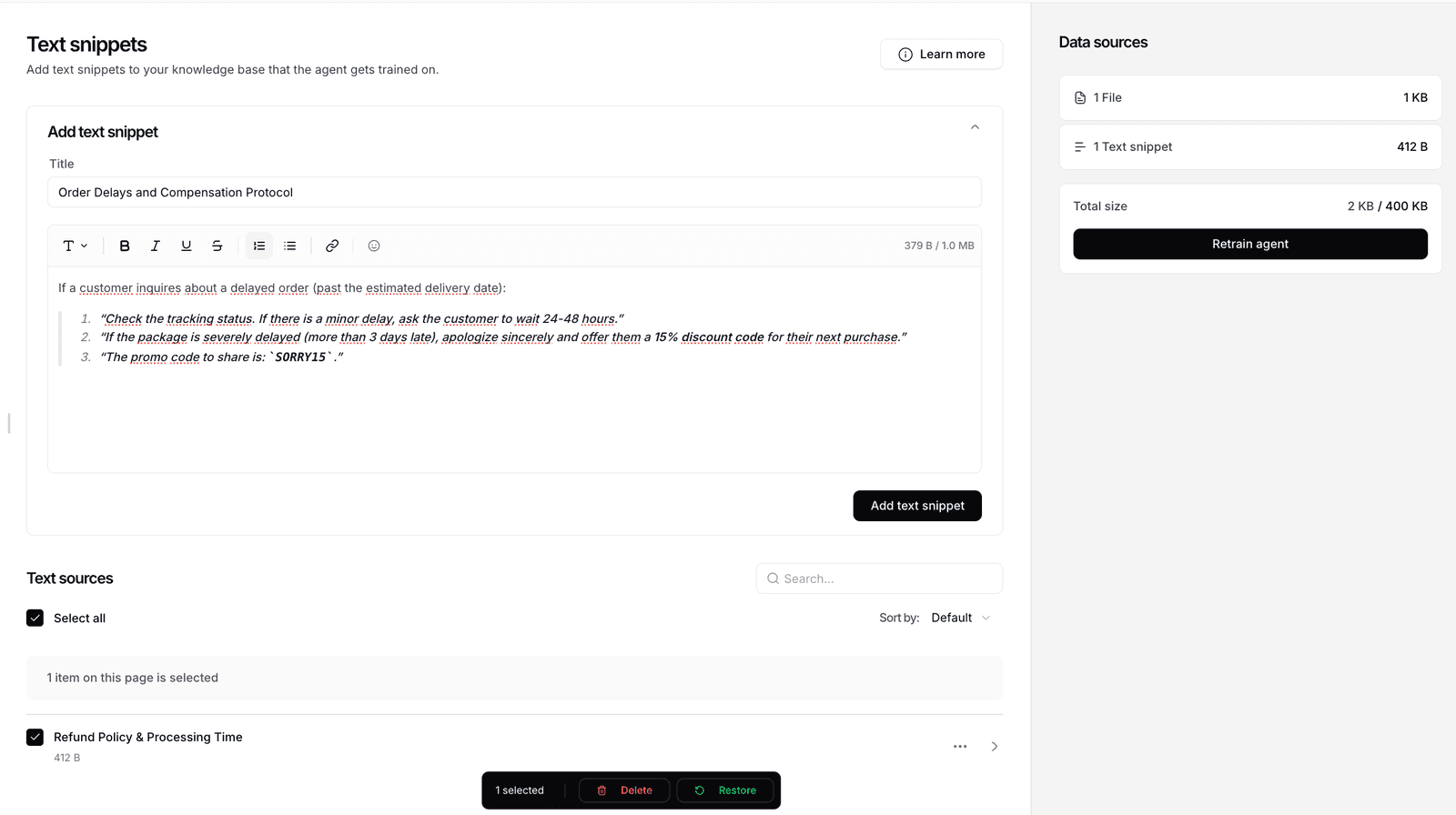 Chatbase Text snippets page showing Add text snippet form with Title field Order Delays and Compensation Protocol, rich text editor with formatting toolbar BIUS containing numbered list of 3 items 1 Check the tracking status If there is a minor delay ask the customer to wait 24-48 hours 2 If the package is severely delayed more than 3 days late apologize sincerely and offer them a 15% discount code for their next purchase 3 The promo code to share is SORRY15, character count 379 B / 1.0 MB, Text sources list with 1 item selected showing Refund Policy and Processing Time, right rail Data sources panel showing 1 File 1KB and 1 Text snippet 412B Total size 2 KB / 400 KB Retrain agent, bottom toolbar with 1 selected Delete Restore buttons