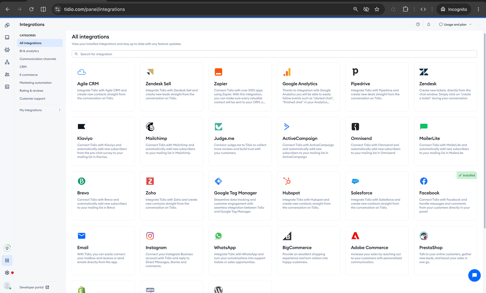 Tidio Integrations catalog showing tiles for Agile CRM, Zendesk Sell, Zapier, Google Analytics, Pipedrive, Zendesk, Klaviyo, Mailchimp, ActiveCampaign, Omnisend, MailerLite, Brevo, HubSpot, Salesforce, Facebook (installed), Instagram, WhatsApp, BigCommerce, Adobe Commerce, PrestaShop